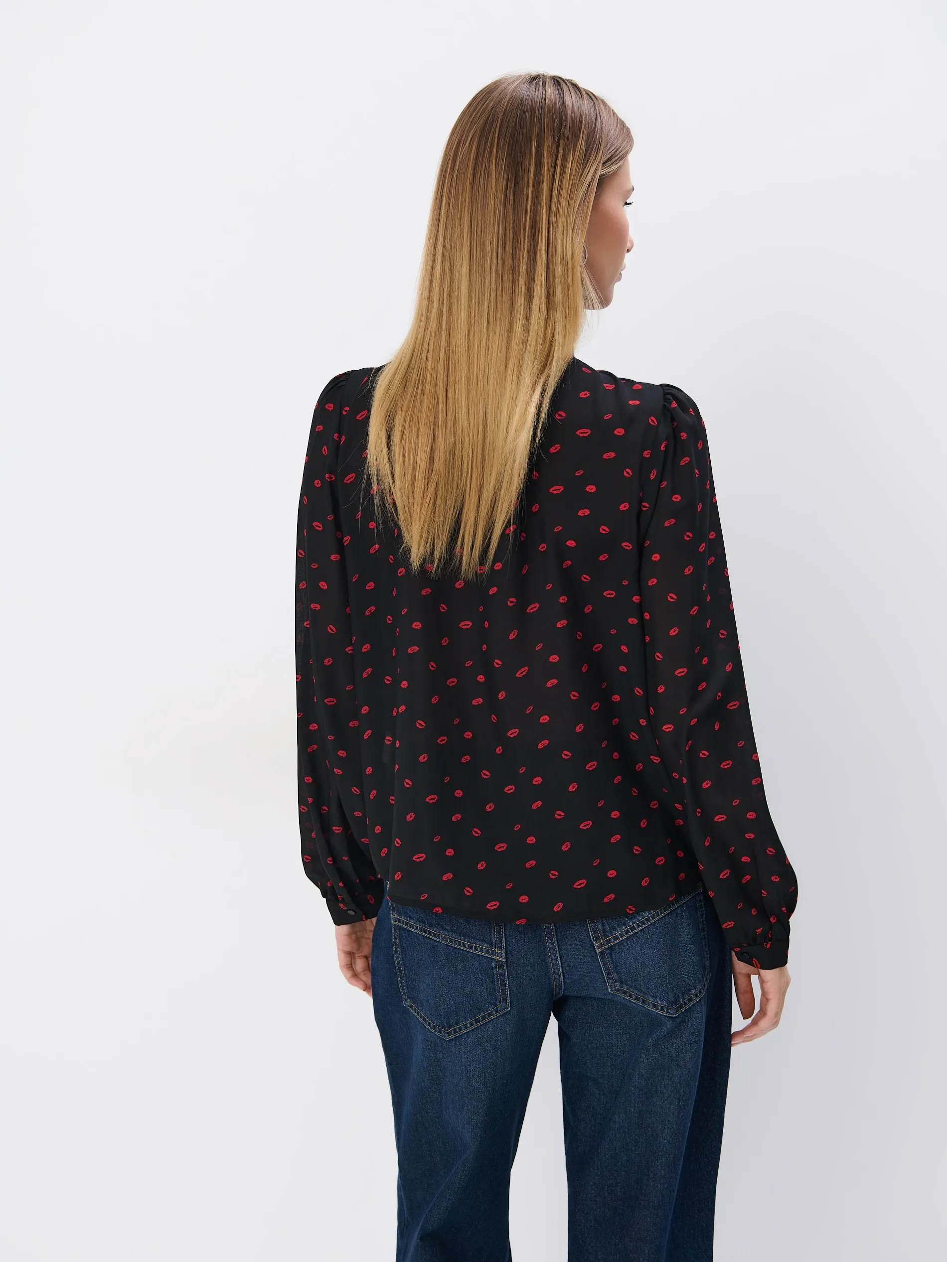 Blusa con allacciatura