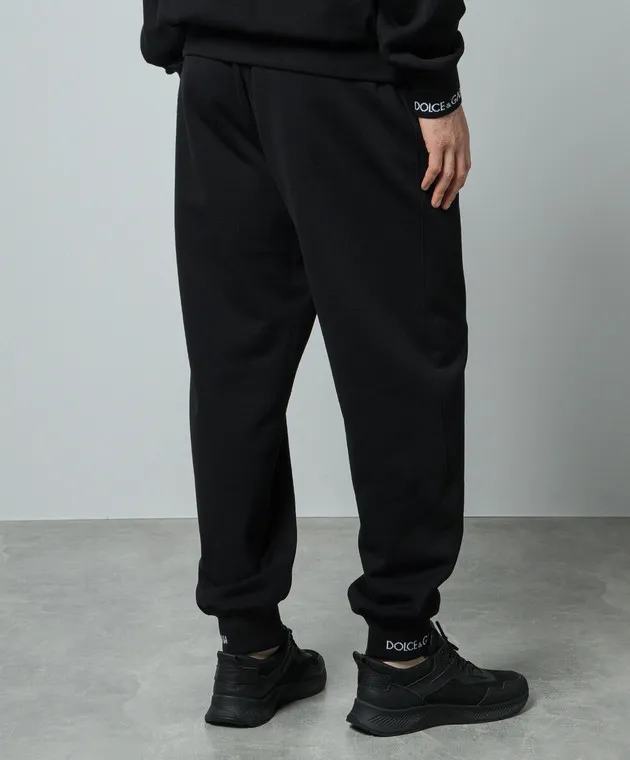 Dolce&Gabbana Joggers neri con fantasia logo GV3CXTHU7AL